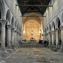 L'interno della Basilica, con l'antica pavimentazione e mosaico..
